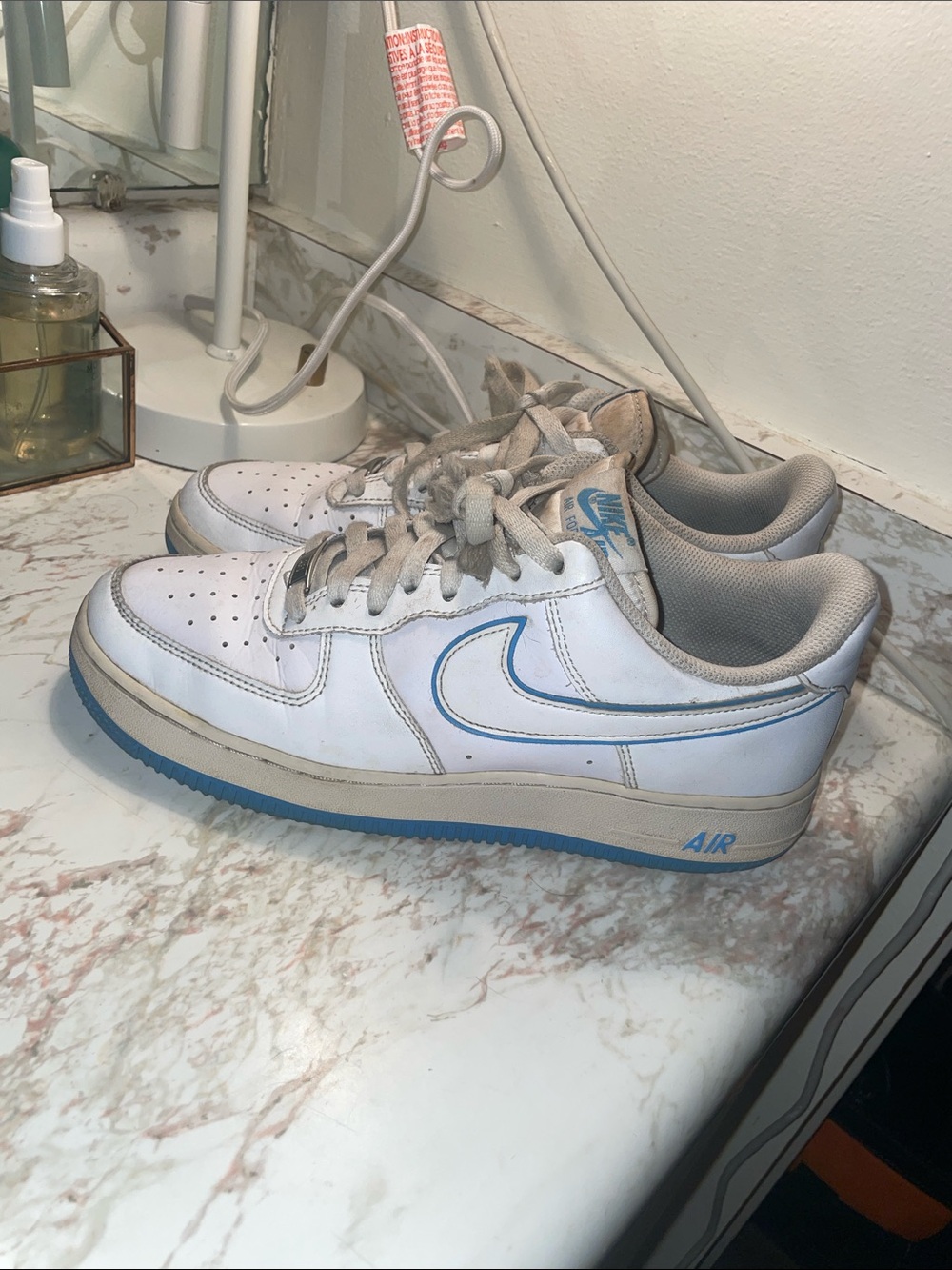 Nike AF1 ‘07 White Sneakers with Blue Swoosh and Blue Outsole